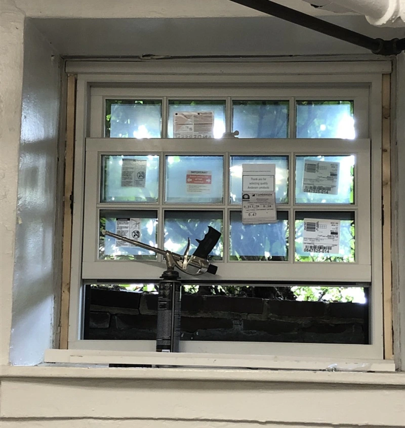OSI Spray foam being used to insulate these Andersen windows
